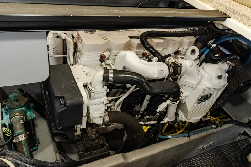 Slide: The Image of Engine compartment of a 2009 Meridian 391 Sedan boat, showcasing mechanical components. - 46