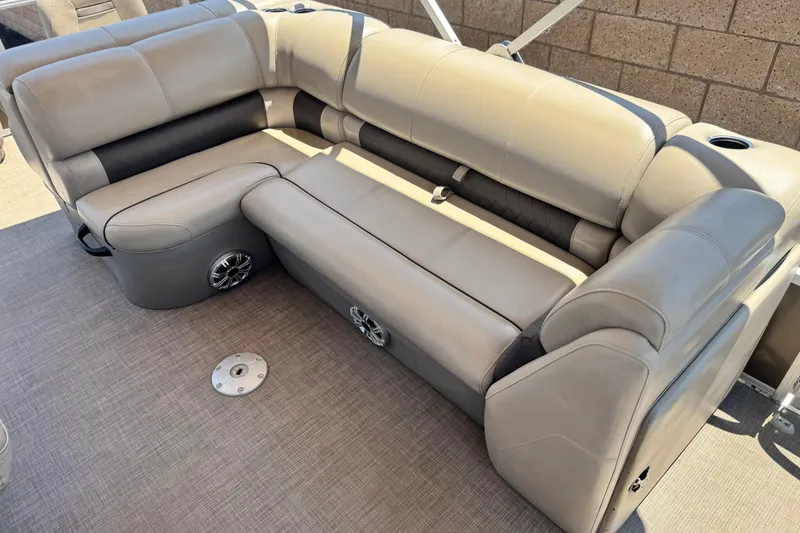 Slide: The Image of Luxurious seating on 2023 Sun Tracker SportFish 20 DLX pontoon boat, featuring plush upholstery. - 14