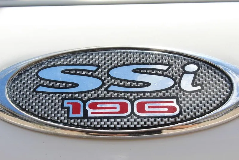 Slide: The Image of Emblem of 2000 Chaparral 196 SSi boat with textured background. - 11