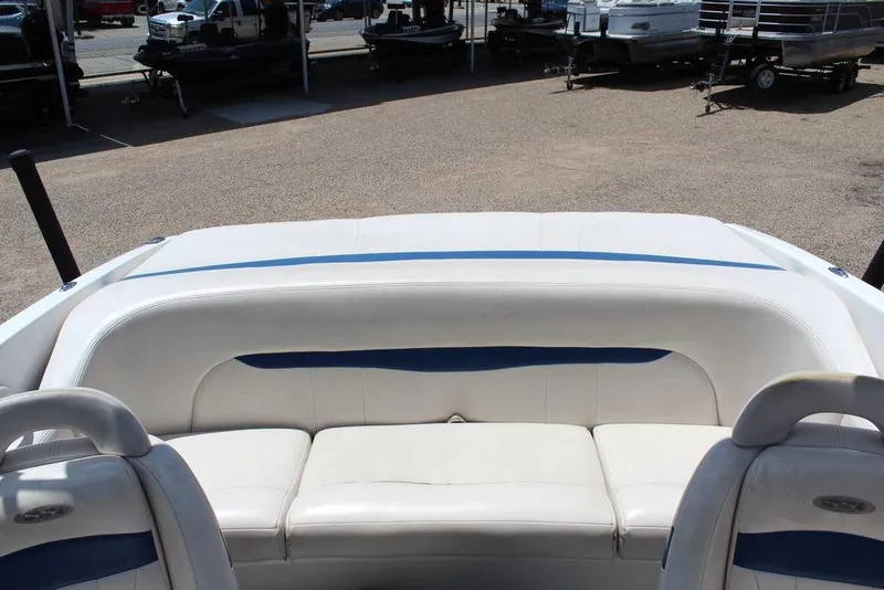 Slide: The Image of 2000 Chaparral 196 SSi boat interior with white and blue seating. - 15