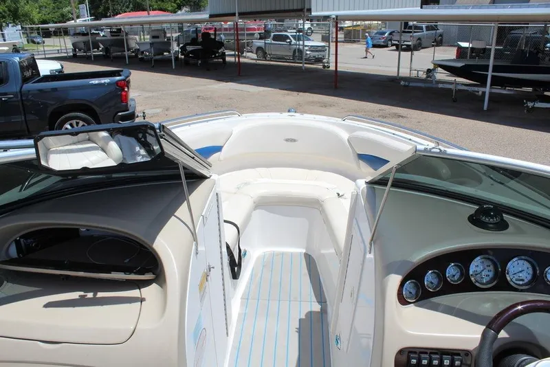 Slide: The Image of 2000 Chaparral 196 SSi boat interior with dashboard and seating area. - 6
