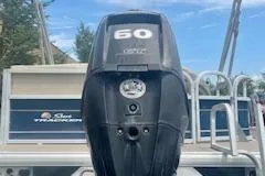 Slide: The Image of 2021 Sun Tracker Party Barge 18 DLX with 60 HP outboard motor. - 5