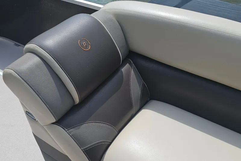 Slide: The Image of Luxurious seating on 2015 Premier 310 Escalante boat, featuring elegant leather upholstery. - 11