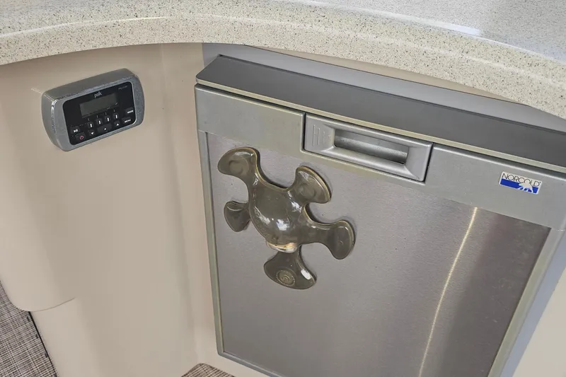 Slide: The Image of 2015 Premier 310 Escalante interior with Norcold fridge and Polk audio system. - 16