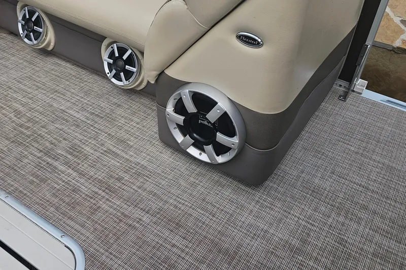 Slide: The Image of 2015 Premier 310 Escalante boat interior with Flexsteel seating and Polk audio speakers. - 21