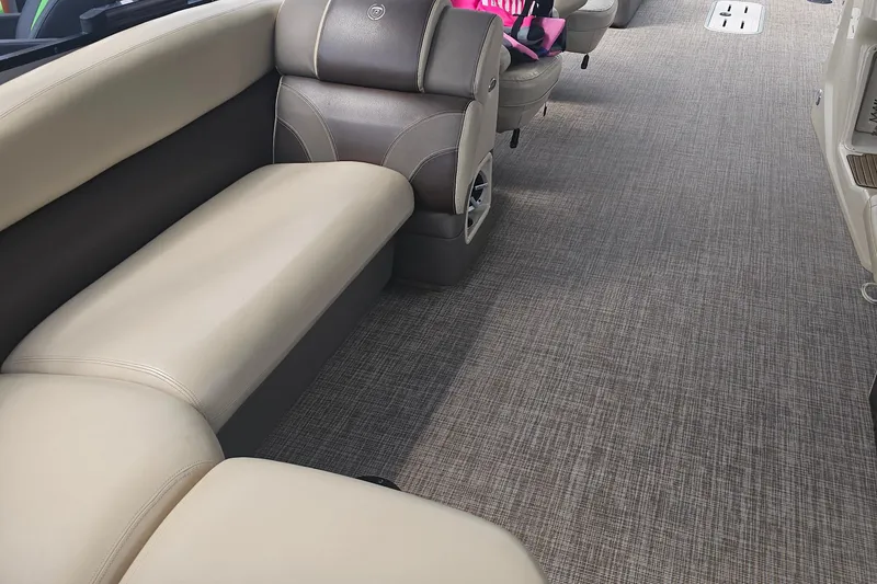 Slide: The Image of Luxurious interior seating of a 2015 Premier 310 Escalante pontoon boat. - 29