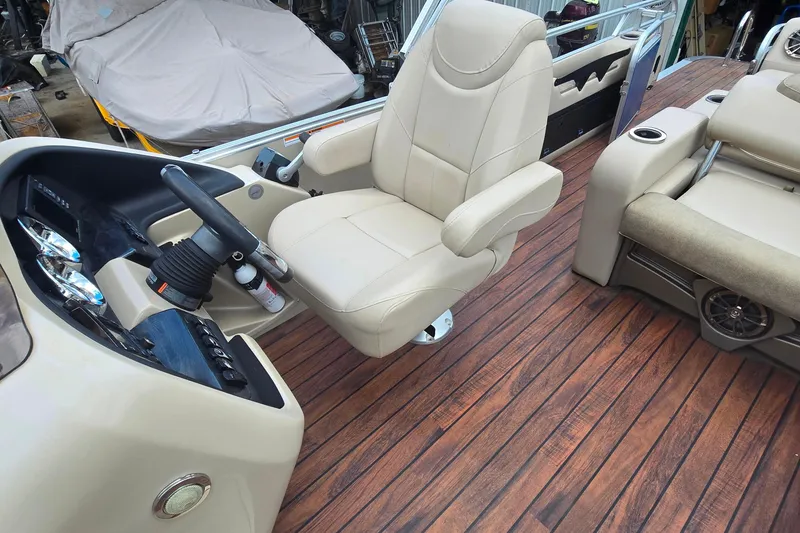 Slide: The Image of Luxurious 2019 Avalon 2585 VRL boat interior with plush seating and wood-style flooring. - 5