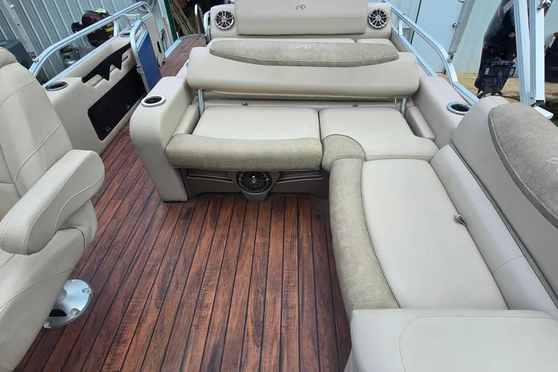 Slide: The Image of Luxurious interior of 2019 Avalon 2585 VRL boat with plush seating and wood-style flooring. - 6