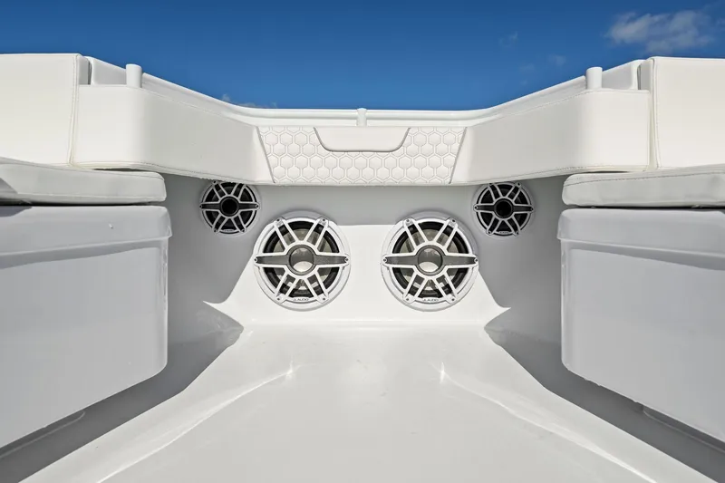 Slide: The Image of 2026 Contender 44 Fisharound boat interior with speakers and cushioned seating. - 21