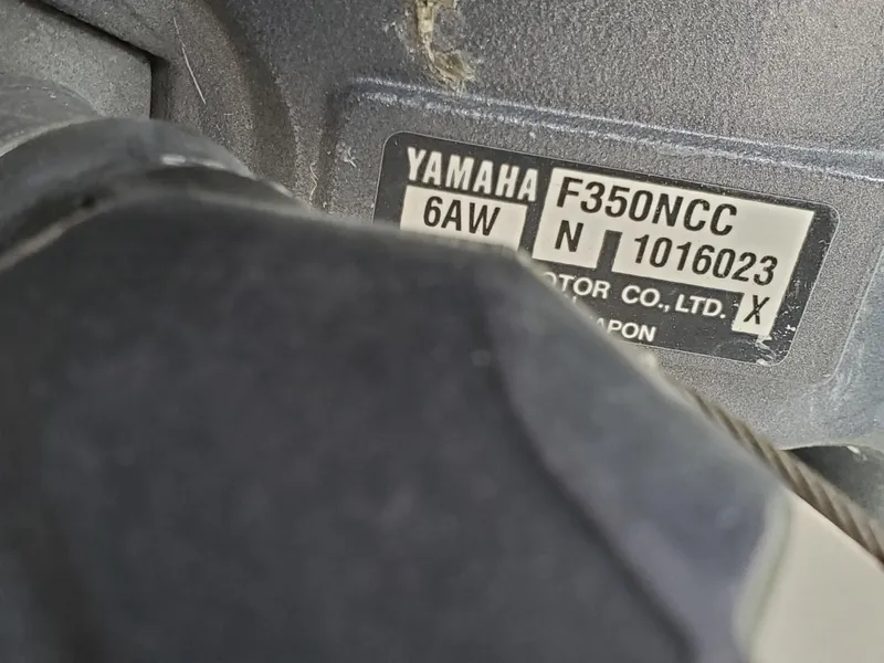 Slide: The Image of Yamaha engine part with manufacturing date label, October 2017, on Grady-White Express 330 boat. - 11