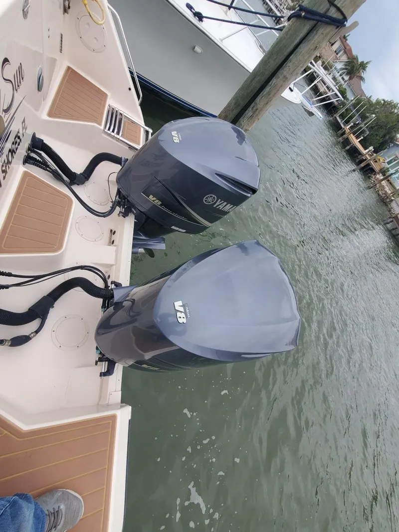 Slide: The Image of 2018 Grady-White Express 330 with Yamaha V8 outboard engines on water. - 14