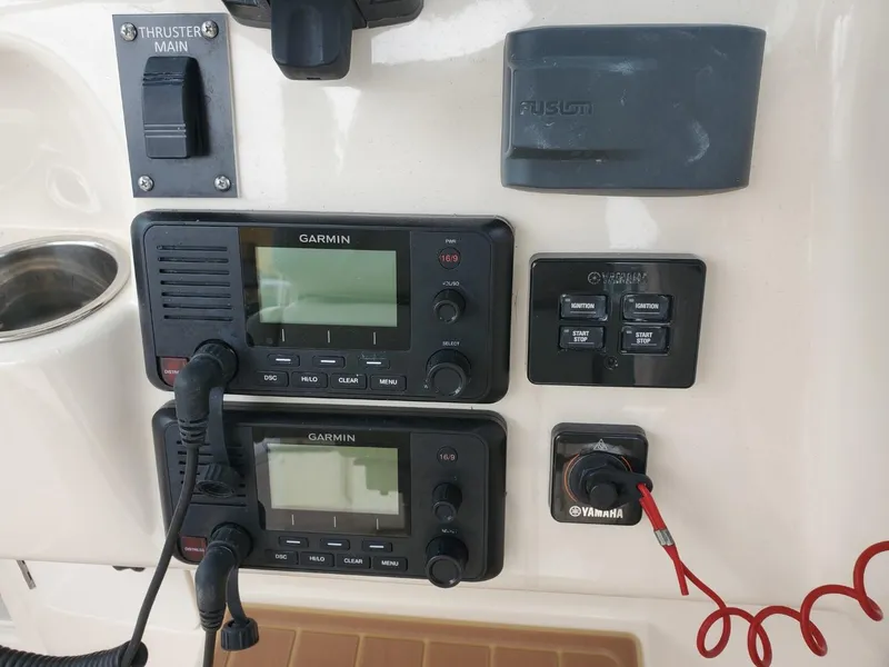 Slide: The Image of Dashboard of 2018 Grady-White Express 330 with dual Garmin displays. - 27