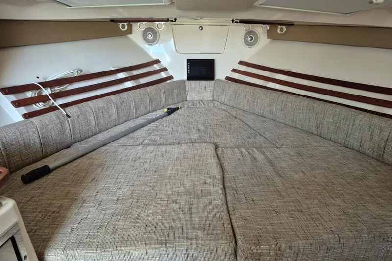 Slide: The Image of 2018 Grady-White Express 330 cabin interior with spacious cushioned seating. - 67