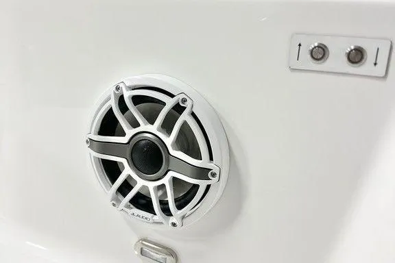 Slide: The Image of 2025 Sportsman Open 302 boat speaker and control panel detail. - 13
