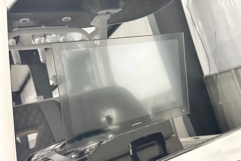 Slide: The Image of Garmin display on 2025 Sportsman Open 302 boat dashboard, showcasing modern navigation technology. - 8