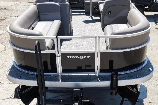Slide: The Image of 2024 Ranger RP200C pontoon boat with gray seating and open deck. - 6