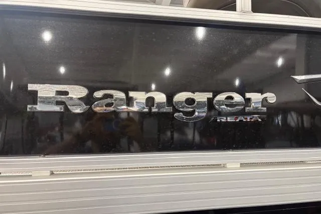 Slide: The Image of 2024 Ranger RP200C boat logo on a sleek, reflective surface. - 7