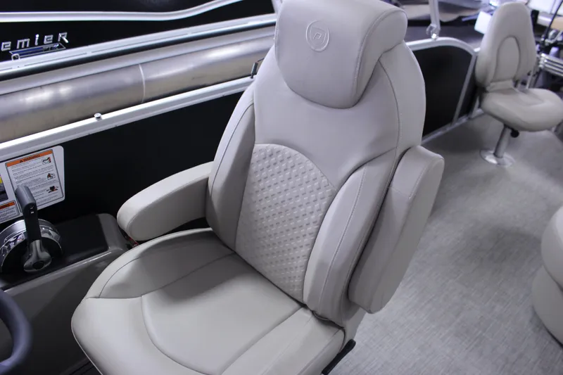 Slide: The Image of Luxurious seating in 2022 Premier 230 Explorer boat, featuring ergonomic design and premium materials. - 26