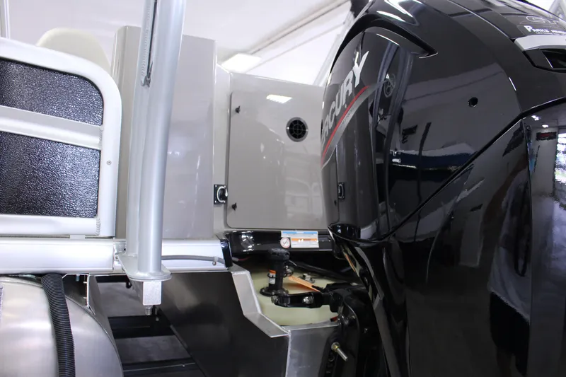 Slide: The Image of 2022 Premier 230 Explorer boat with Mercury outboard motor, interior view. - 9