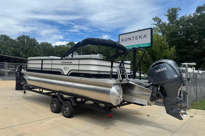Slide: The Image of 2025 Veranda Vista Sport VS 22 RC pontoon boat with Yamaha engine at Boateka dealership. - 2