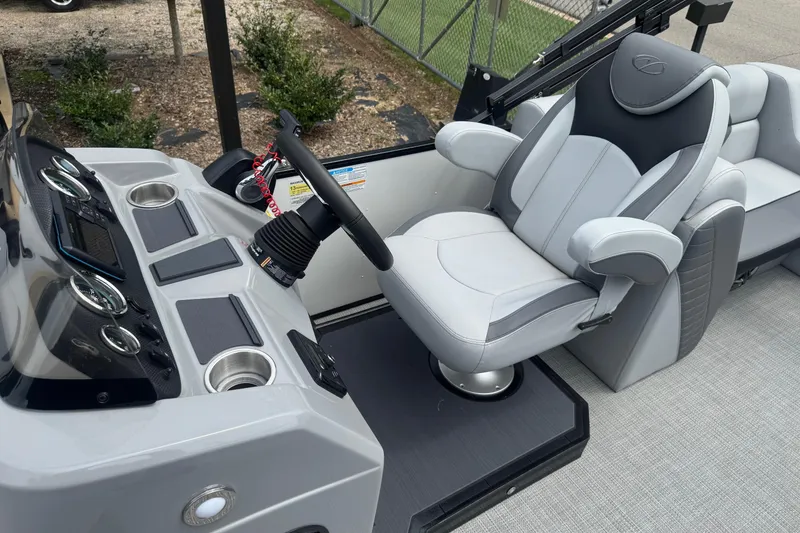 Slide: The Image of 2025 Veranda Vista Sport VS 22 RC boat interior with modern helm and comfortable seating. - 6