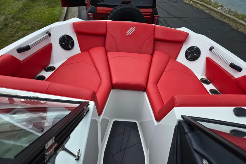 Slide: The Image of 2022 ATX Surf Boats 20 Type-S with red seating and speakers. - 17
