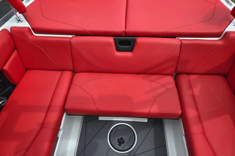 Slide: The Image of Red seating area of 2022 ATX Surf Boats 20 Type-S, featuring modern design and cup holder. - 21