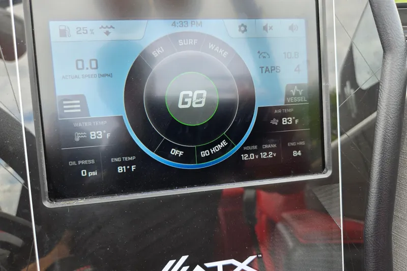 Slide: The Image of ATX Surf Boats 2022 dashboard display showing speed, temperature, and settings. - 23