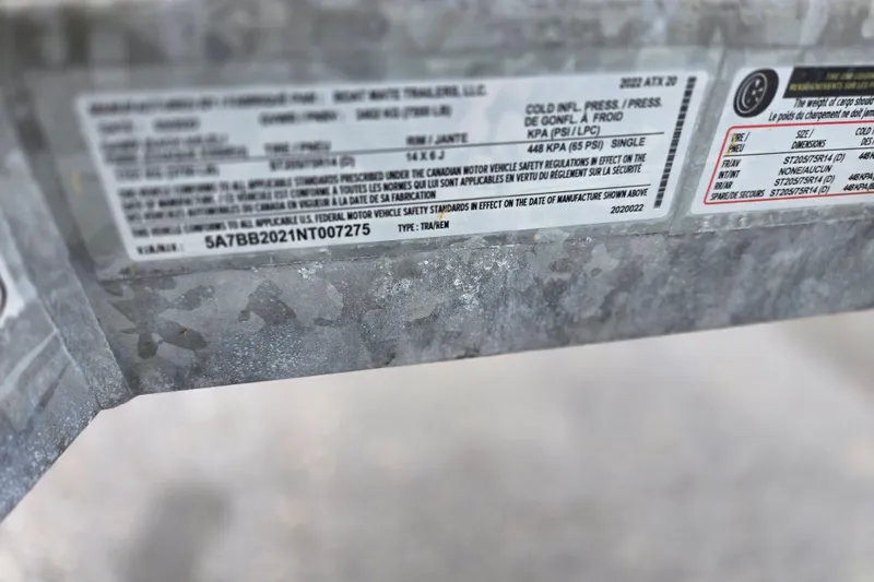 Slide: The Image of Label on 2022 ATX Surf Boats 20 Type-S trailer, displaying specifications and safety information. - 8