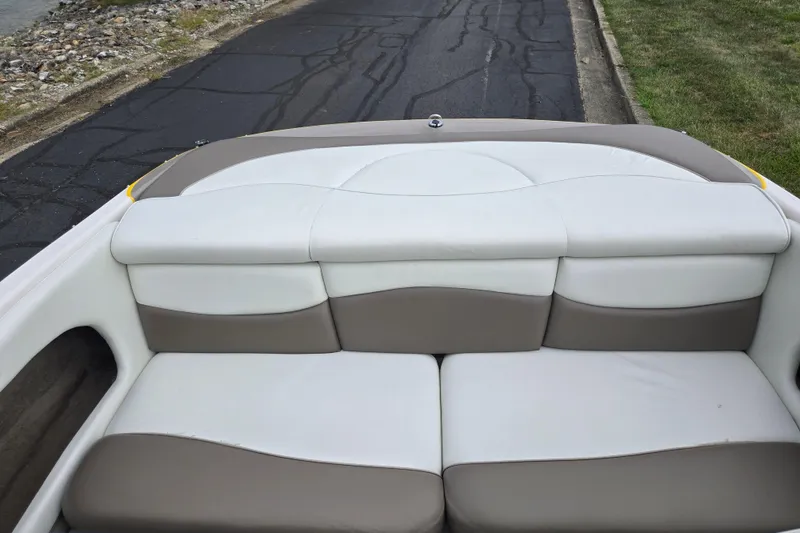 Slide: The Image of Rear seating of a 2001 Tahoe Q5S I/O boat with white and beige upholstery. - 21