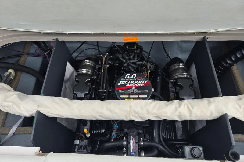 Slide: The Image of Engine compartment of a 2001 Tahoe Q5S I/O with Mercury MerCruiser 5.0 engine. - 23