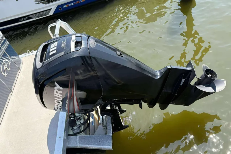 Slide: The Image of 2018 Avalon GS 2185 CR with Mercury 115 outboard motor at dockside. - 17