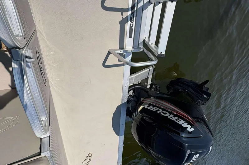 Slide: The Image of 2018 Avalon GS 2185 CR boat with Mercury outboard motor on water. - 18