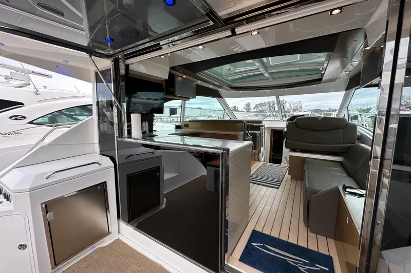 Slide: The Image of Interior of 2013 Cruisers Yachts 45 Cantius with modern seating and sleek design. - 10
