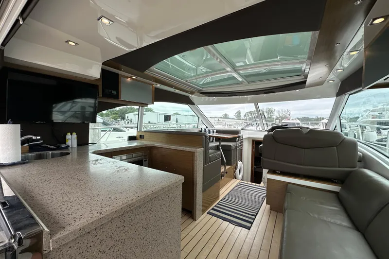 Slide: The Image of Luxurious interior of 2013 Cruisers Yachts 45 Cantius with modern amenities and panoramic windows. - 11