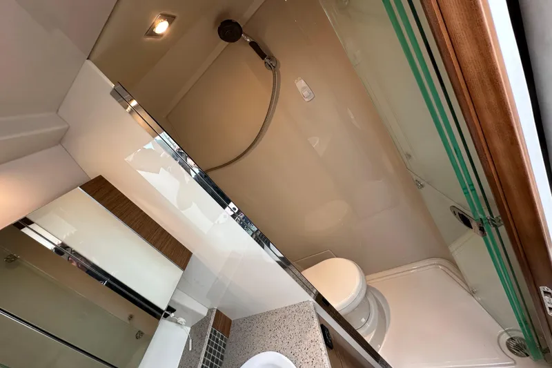 Slide: The Image of Bathroom interior of 2013 Cruisers Yachts 45 Cantius with shower and toilet. - 31