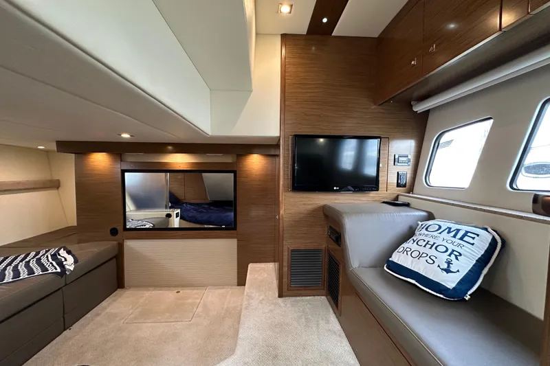Slide: The Image of Luxurious interior of 2013 Cruisers Yachts 45 Cantius with modern furnishings and cozy seating. - 33