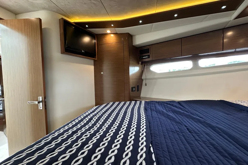 Slide: The Image of Luxurious bedroom interior of 2013 Cruisers Yachts 45 Cantius with modern design and cozy bedding. - 26