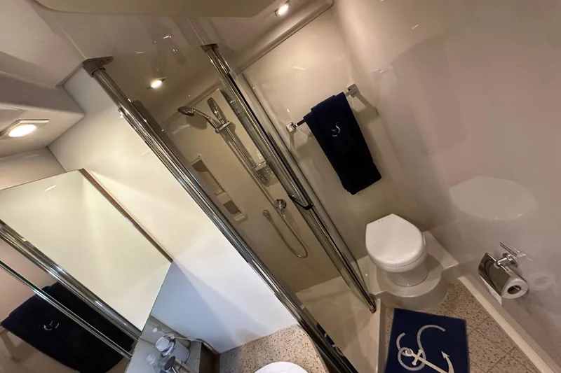 Slide: The Image of Bathroom interior of 2013 Cruisers Yachts 45 Cantius, featuring shower and toilet. - 27