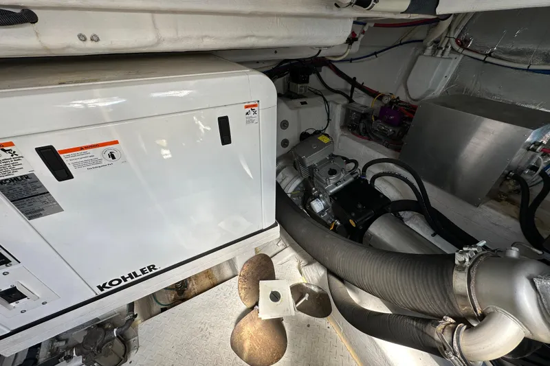 Slide: The Image of Engine room of 2013 Cruisers Yachts 45 Cantius with Kohler generator and mechanical components. - 40