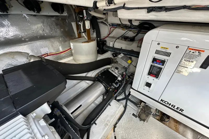 Slide: The Image of Engine room of 2013 Cruisers Yachts 45 Cantius with Kohler generator and mechanical components. - 41