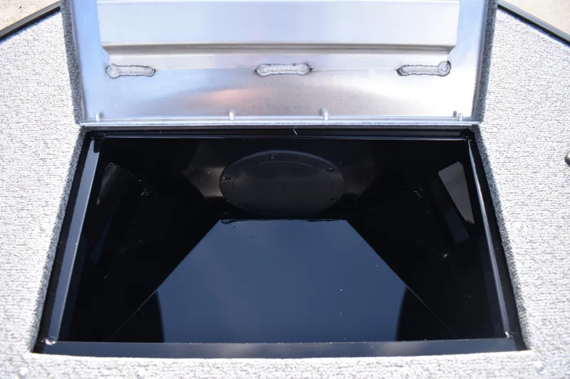 Slide: The Image of Open storage compartment on 2026 Lowe Sport Deck 224 boat. - 16