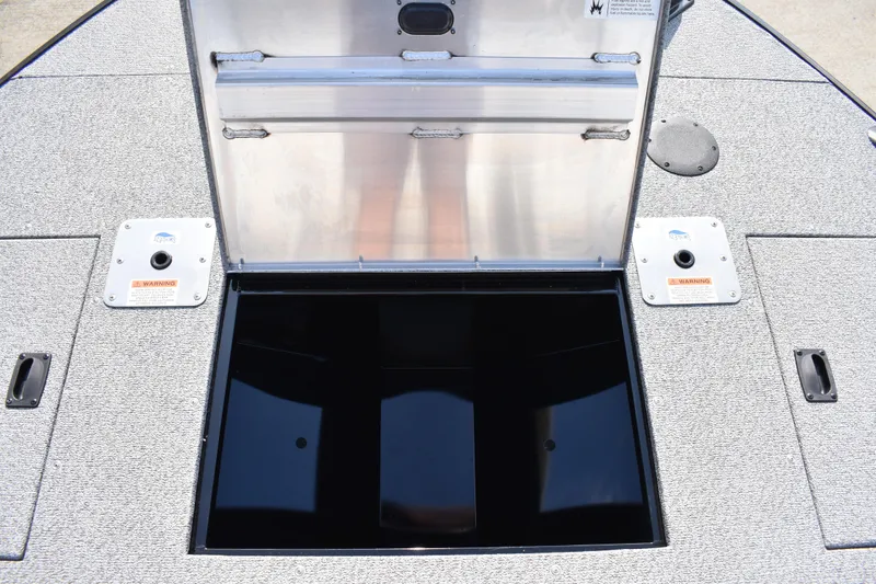 Slide: The Image of Open storage compartment on 2026 Lowe Sport Deck 224 boat. - 20