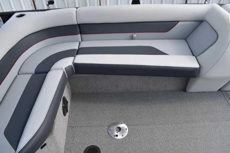 Slide: The Image of 2026 Lowe Sport Deck 224 boat interior with gray and white cushioned seating. - 37