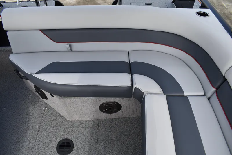 Slide: The Image of 2026 Lowe Sport Deck 224 boat interior with gray and white cushioned seating. - 38