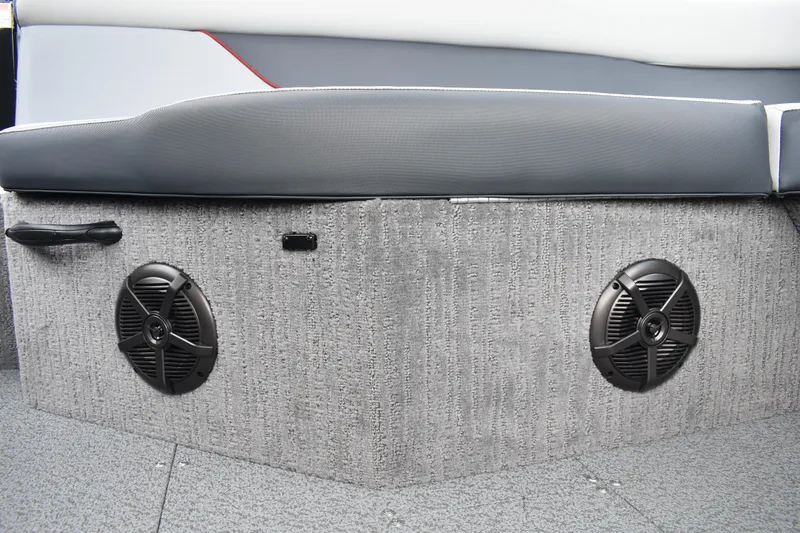 Slide: The Image of 2026 Lowe Sport Deck 224 interior with speakers and cushioned seating. - 41