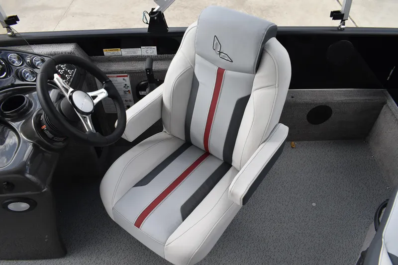 Slide: The Image of 2026 Lowe Sport Deck 224 boat interior with stylish captain's chair and steering wheel. - 43