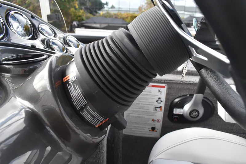 Slide: The Image of Steering wheel and dashboard of 2026 Lowe Sport Deck 224 boat. - 48