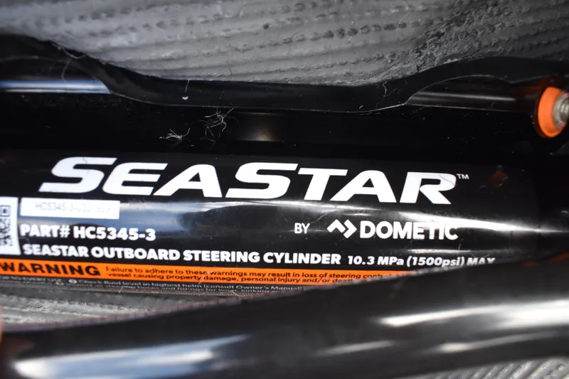 Slide: The Image of SeaStar outboard steering cylinder by Dometic, part HC5345-3, on 2026 Lowe Sport Deck 224. - 59