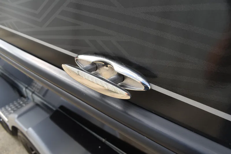 Slide: The Image of 2026 Lowe Sport Deck 224 boat cleat on sleek black hull design. - 62